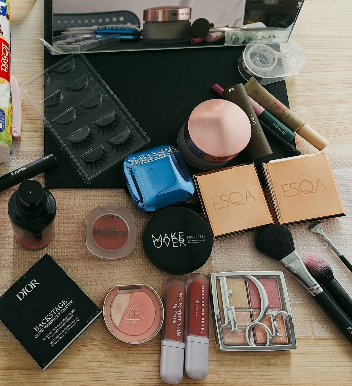 flat lay of diverse cosmetics on table